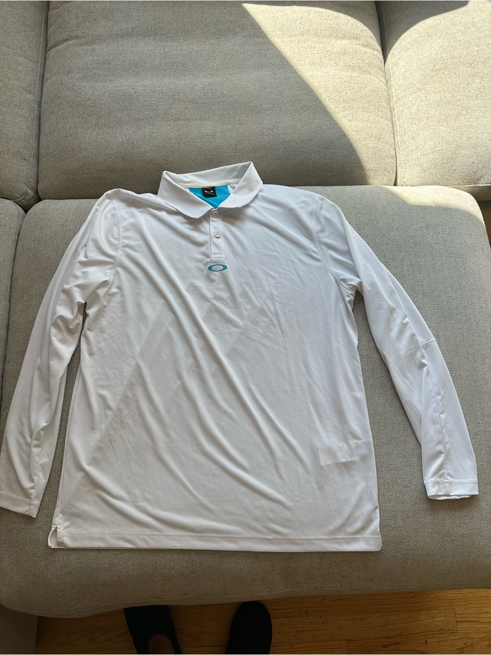 Oakley Men’s White Long-Sleeve Polo with Teal Logo